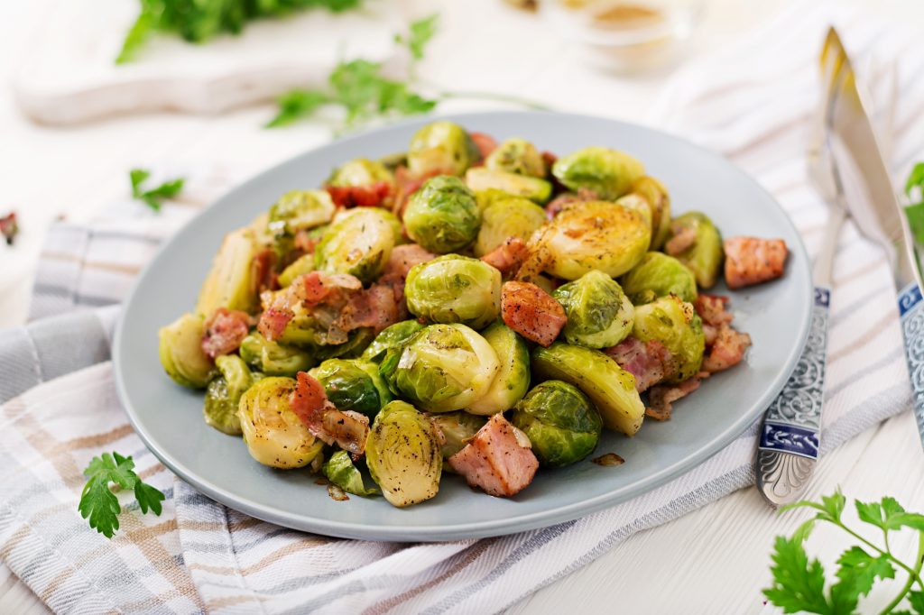 Brussels sprouts. Roasted Brussels sprouts with bacon. Delicious lunch.