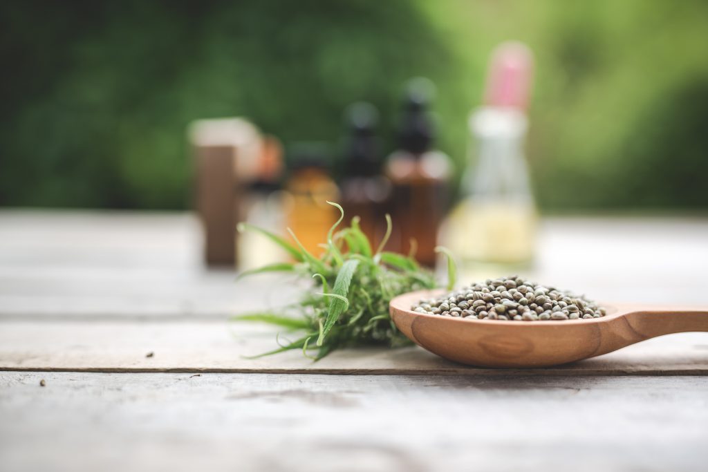 Cannabis, Cannabis seeds, Cannabis oil Placed on a wooden floor